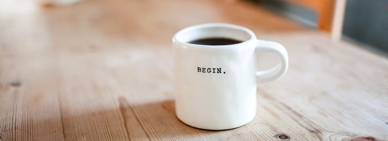 Mug with 'Begin' on front